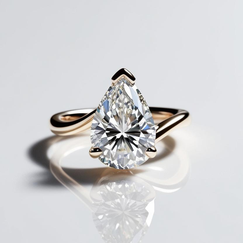 0.70ct Pear Solitaire Natural or Lab-Grown Diamond Twist Modern Ring in 9k Gold