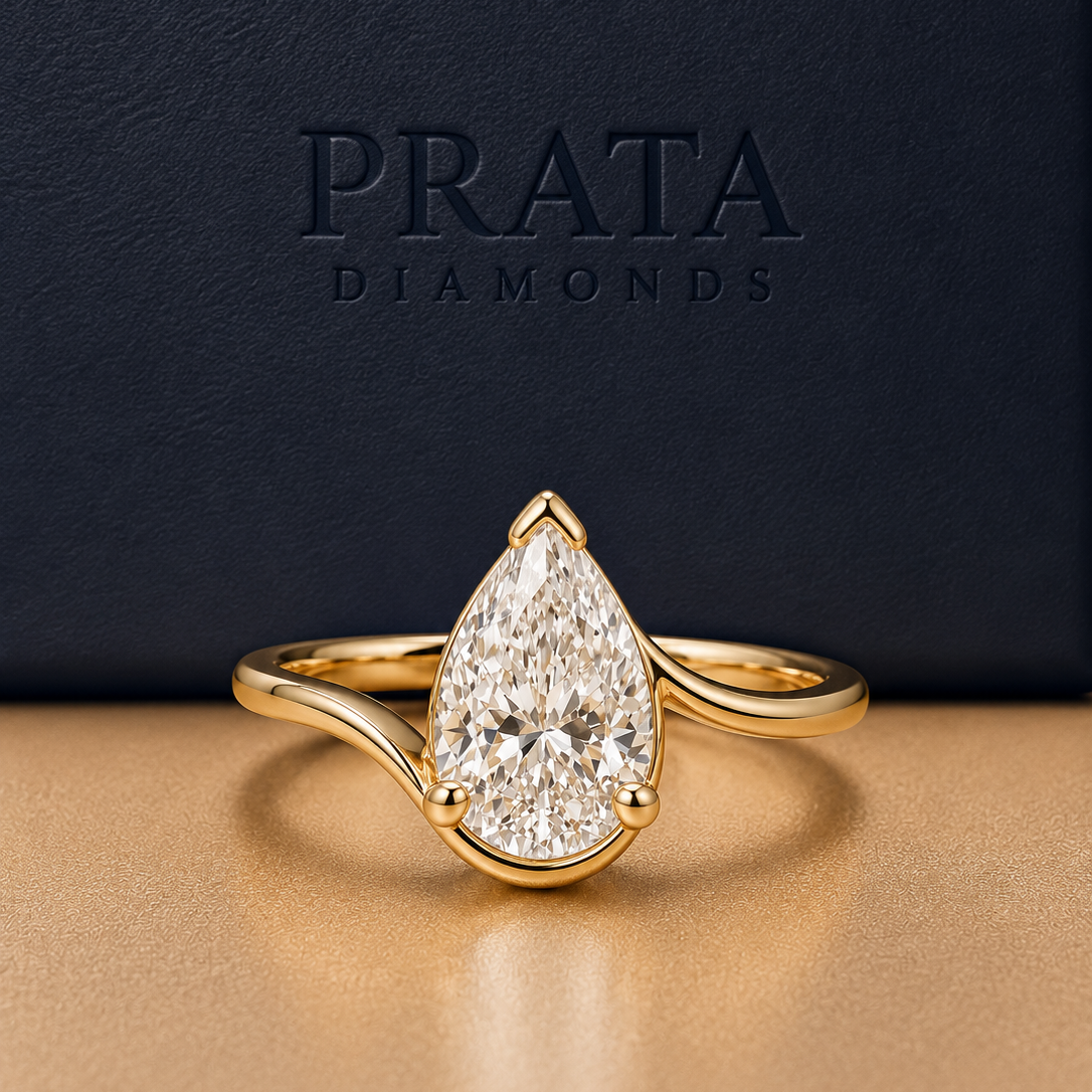 Pear Diamond Swirl Solitaire Ring